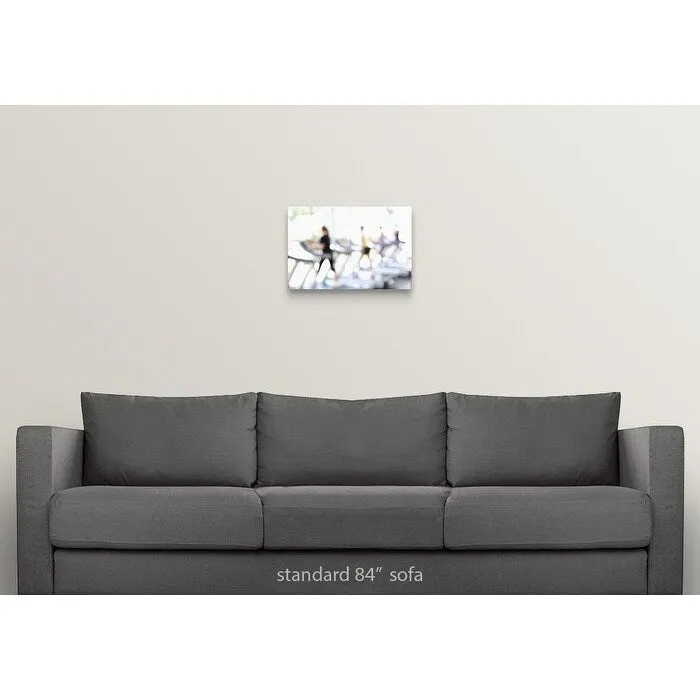 "Defocused view of people on treadmills in health club" Canvas Wall Art